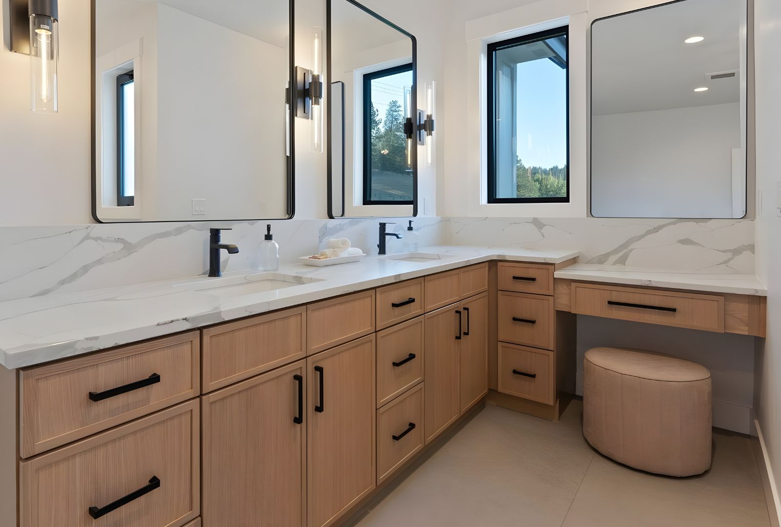 Contemporary bathroom with polished chrome hardware from Hardware Hut, featuring towel bars, cabinet knobs, and a minimalist vanity setup.