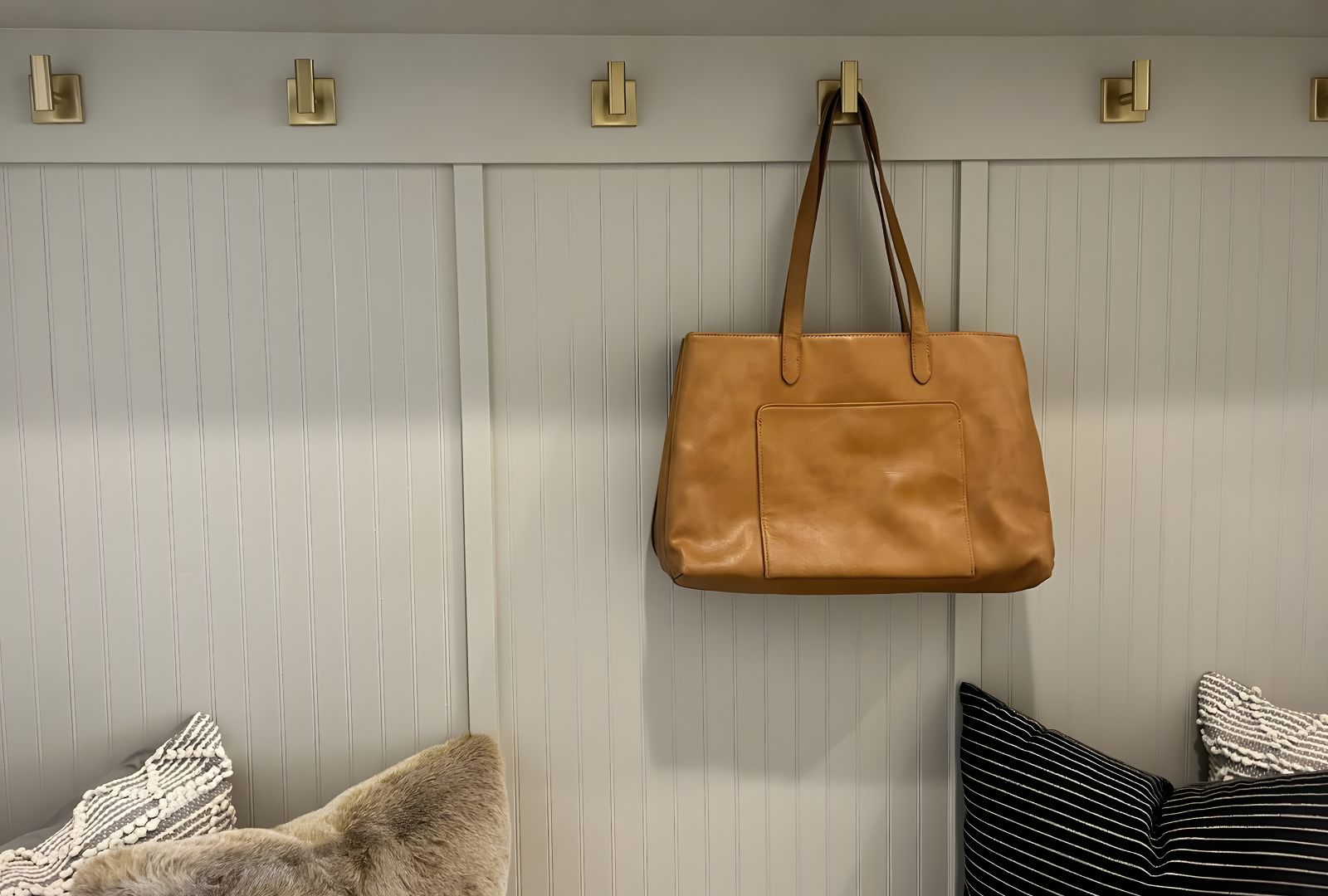 Decorative and functional hooks for home organization, including wall hooks, coat hooks, and utility hooks in various finishes and designs, available on hardwarehut.com