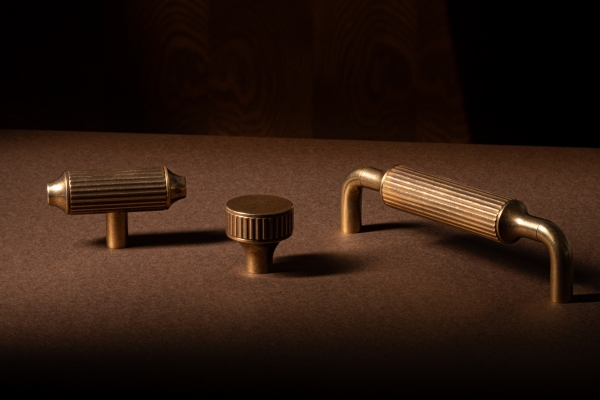 Luxury Armac Martin cabinet knobs available in coordinated solid brass finishes for high-end kitchen and bath design.